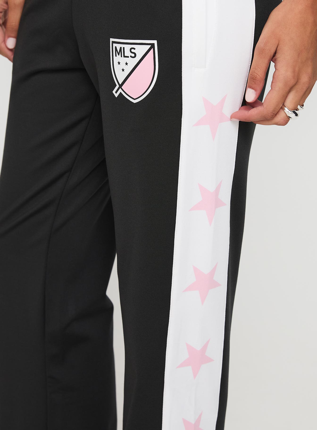 back view of model wearing Princess Polly Track Star Pants Black Low Rise Pants 