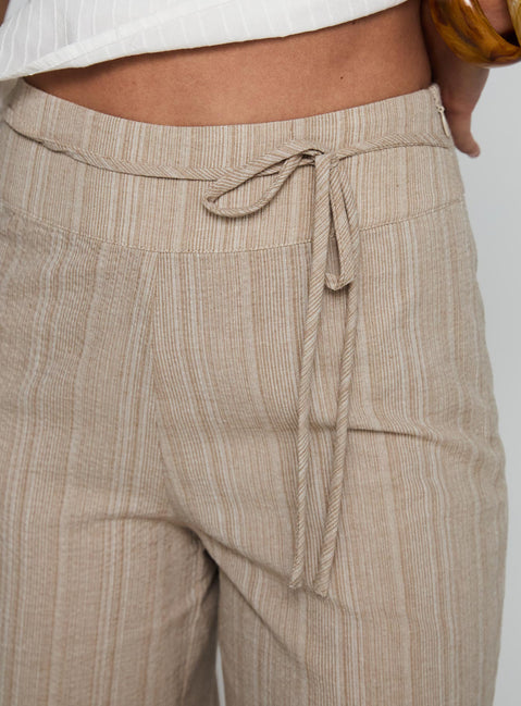 side view of model wearing Princess Polly Rush Hours Tie Up Pants Beige 