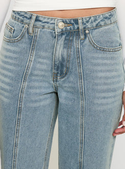 back view of model wearing Princess Polly White Mustang Side Split Jean Light Blue Mid Rise 