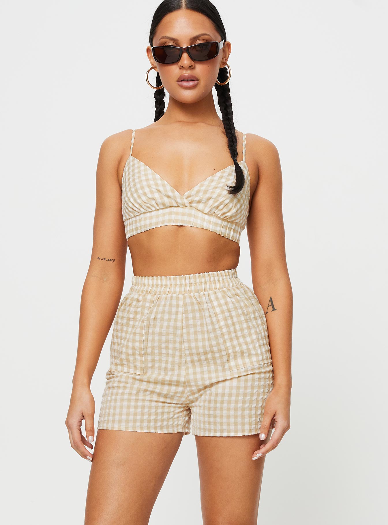 Three-piece matching set Relaxed fit, check print Long sleeve shirt, classic collar, button fastening at front Crop top, adjustable shoulder straps, v-neckline, elasticated band at bust Shorts, elasticated waistband, twin hip pockets