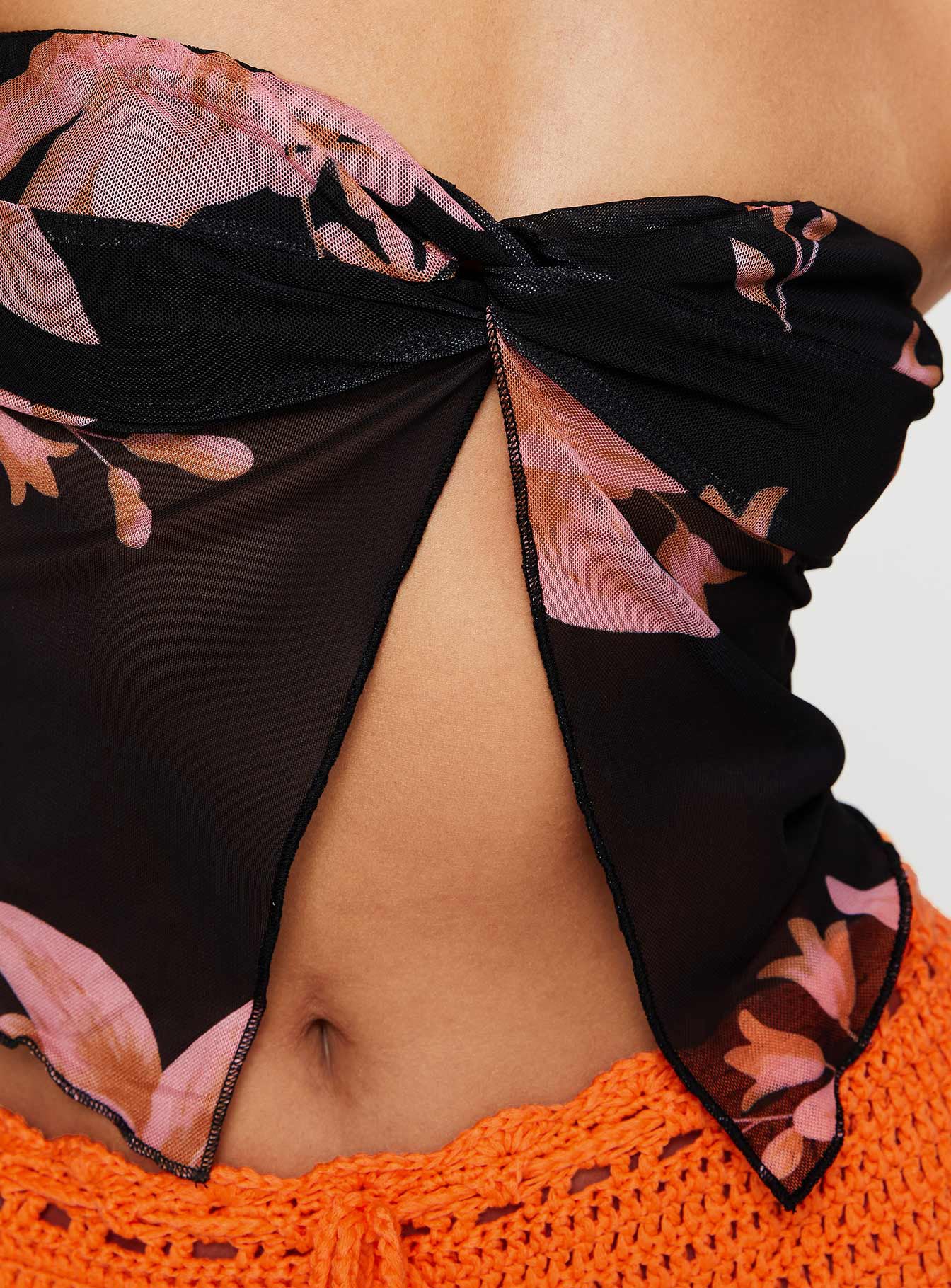 back view of model wearing Princess Polly Mani Top Black Floral Sleeveless Sweetheart 