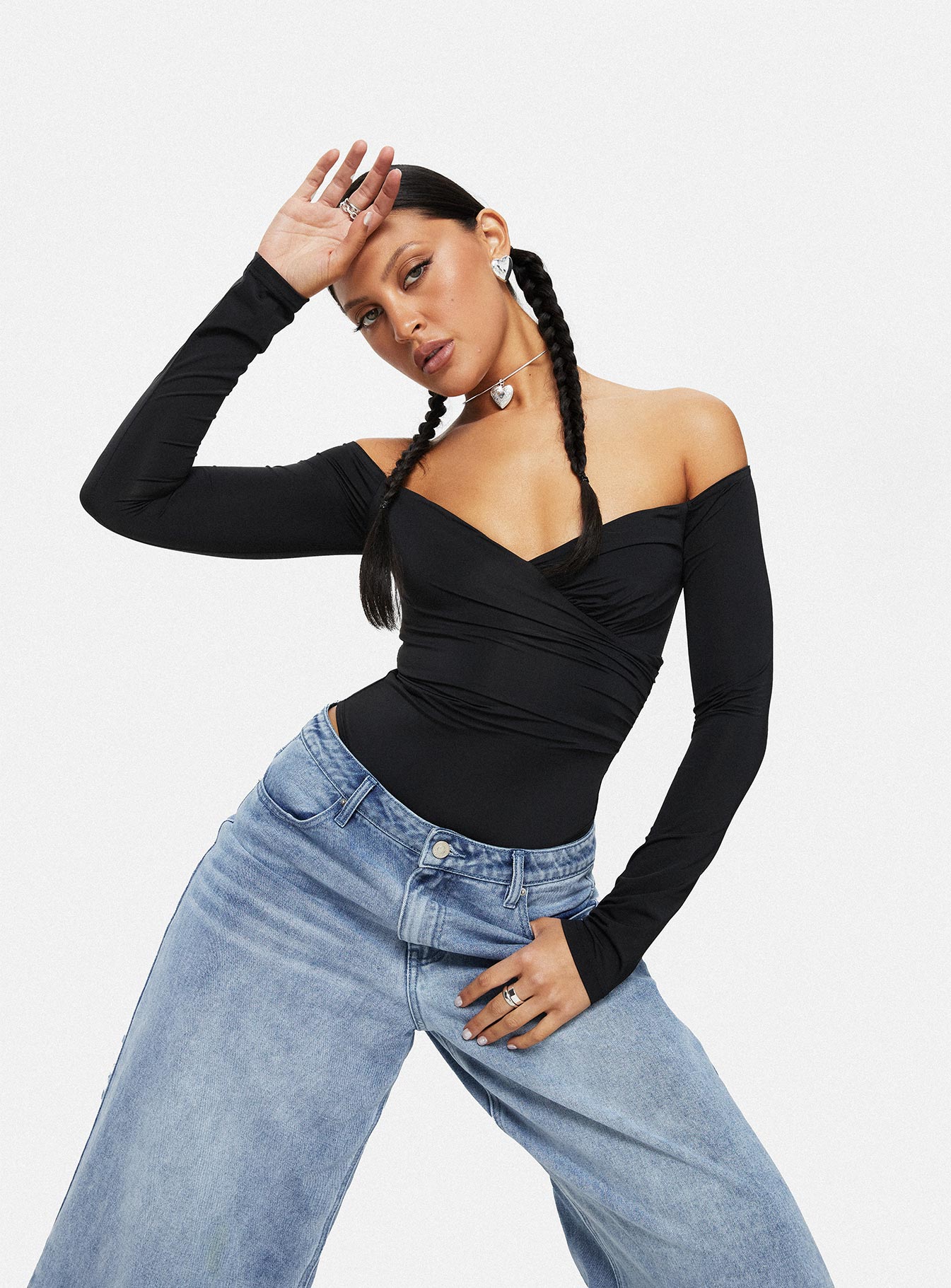 back view of model wearing Princess Polly Tarine Wrap Bodysuit Black Full Sleeves 