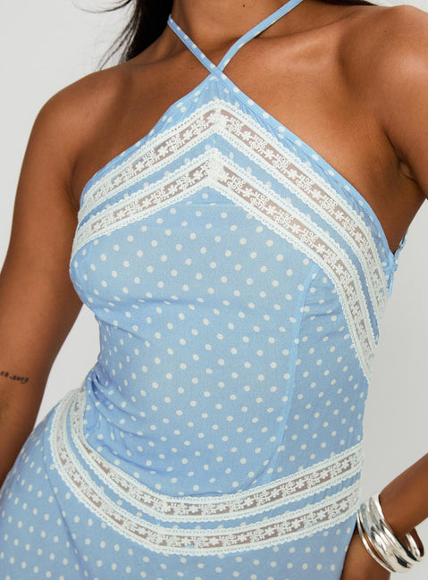 back view of model wearing Princess Polly Wild Joy Halter Maxi Dress Blue Polka Asymmetric Neckline 