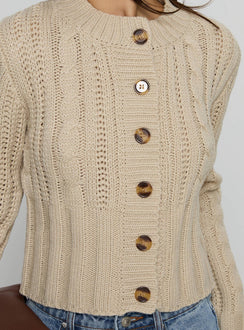 back view of model wearing Princess Polly Donielle Cable Knit Cardigan Beige cropped 