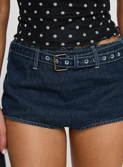 back view of model wearing Princess Polly Halston Briefs Blue Denim High Waisted Shorts 