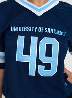 back view of model wearing Princess Polly USD Football Jersey Navy Half Sleeves V-Neck 