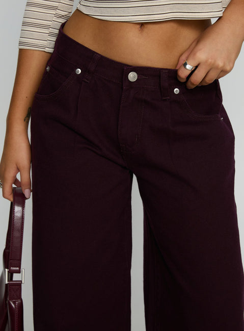 front view of model wearing Princess Polly Supercut Low Rise Baggy Pleat Jeans Currant Mid Rise Jeans 