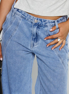 back view of model wearing Princess Polly Reaper Baggy Denim Jeans Light Blue Wash Mid Rise 