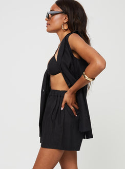 Matching three-piece set  Bra top, halter neck tie fastening  Oversized vest top, lapel collar, button front fastening, twin front pockets  High rise shorts, elasticated waistband, twin hip pockets 