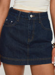 front view of model wearing Princess Polly Heuston Denim Skort Dark Wash Lower Impact High Waisted Shorts 