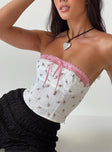 Front view of model wearing  front Princess Polly Sleeveless Asymmetric Neckline  Caitie Strapless Top White Floral