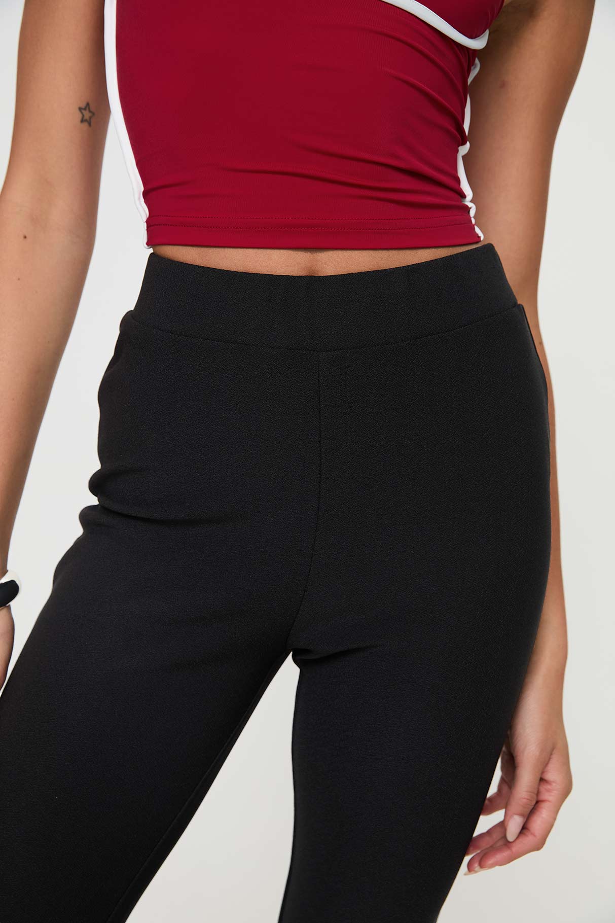 back view of model wearing Princess Polly Vasquez Flared Pants Black High Waisted Pants 