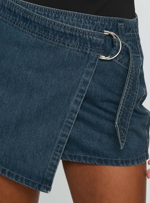 back view of model wearing Princess Polly Elinora Wrap Mini Skirt Mid Blue Wash Mini Skirts 