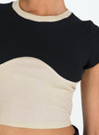 Front view of model wearing  front Princess Polly Short Sleeves Crew Neck  Roka Top Black / Cream