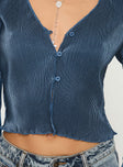 Blue long sleeve top Plisse material, v neckline, flared sleeve, button fastening, split hem