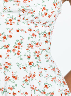 Romper Floral print Ruffle detailing Open back with tie Invisible zip at back Elasticated backband Fixed straps Fully lined