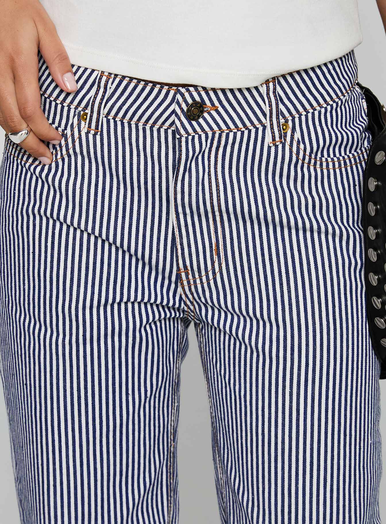 back view of model wearing Princess Polly Top Model Jean Navy Stripe Low Rise Pants 