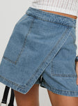 Blue high rise denim skort Wrap style, zip fastening at back, twin hip pockets