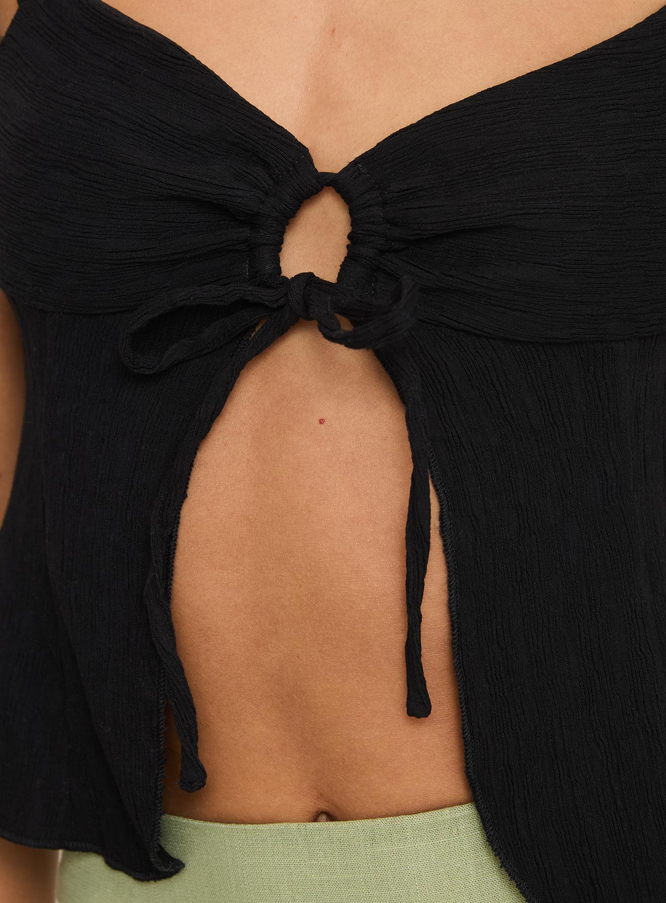 back view of model wearing Princess Polly Moshe Top Black Sleeveless Sweetheart 