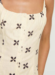 Floral print mini dress Adjustable shoulder straps, scooped neckline, button fastening down front, waist tie fastening at back