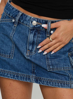 back view of model wearing Princess Polly Pacific Coast Denim Cargo Skirt Dark Wash Mini Skirts 