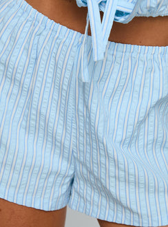 side view of model wearing Princess Polly Saskea Shorts Blue High Waisted Shorts 