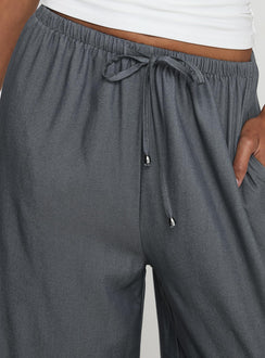 side view of model wearing Princess Polly Tallilah Pants Dark Chambray High Waisted Pants 