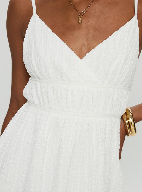 back view of model wearing Princess Polly All Too Well Mini Dress White V-Neck 