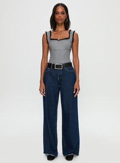 side view of model wearing Princess Polly Trustfund Lace Trim Bodysuit Black / White Check Sleeveless 