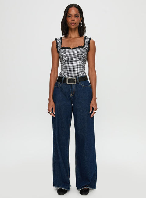 side view of model wearing Princess Polly Trustfund Lace Trim Bodysuit Black / White Check Sleeveless 