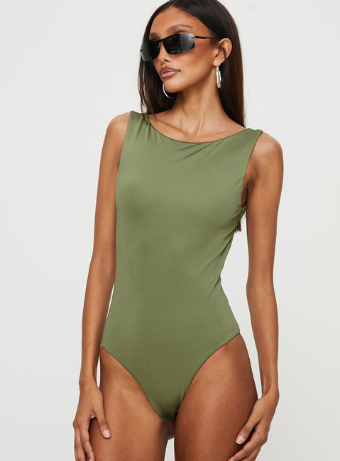 front view of model wearing Princess Polly Coomba Backless Bodysuit Green Sleeveless Boat Neck 