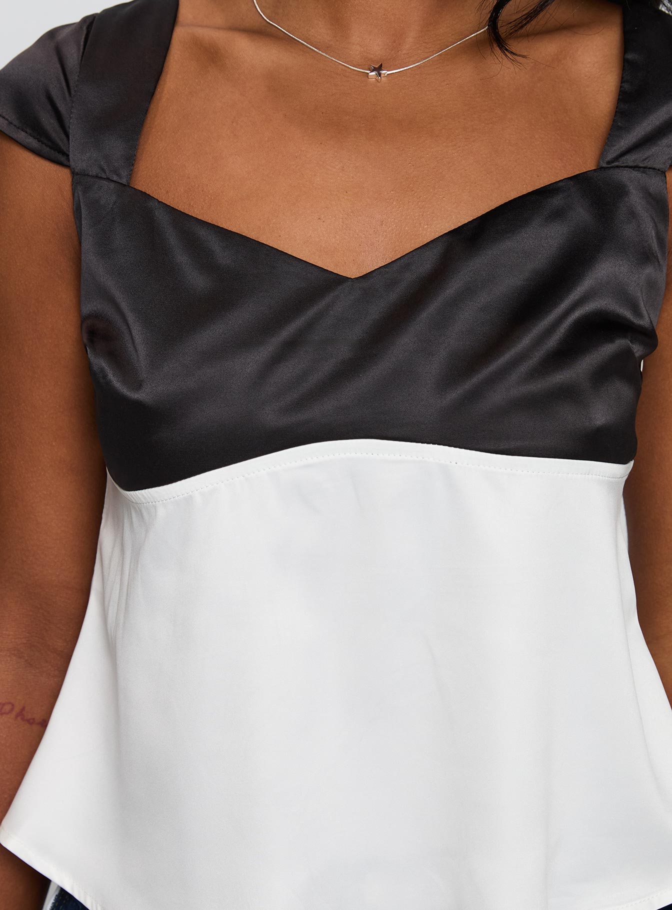 back view of model wearing Princess Polly Think About It Cap Sleeve Top Black / White Short Sleeves V-Neck 