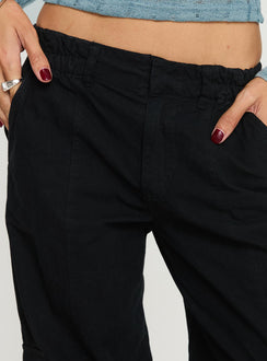 back view of model wearing Princess Polly Chicker Mid Ride Pants Black Low Rise Pants 