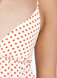 Crop top Polka dot print Adjustable shoulder straps Plunging neckline Slight ruching at bust Tie fastening at back