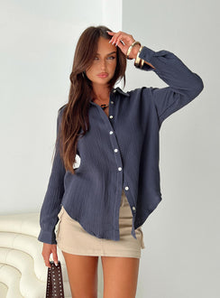 Front view of model wearing  front Princess Polly Full Sleeves High Neck  Mahalia Shirt Steel Blue