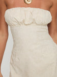 side view of model wearing Princess Polly Luvstruck Strapless Mini Dress Beige Tall Straight Neck 