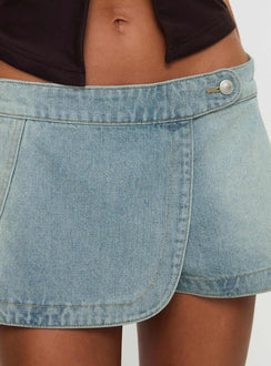 front view of model wearing Princess Polly Down For The Ride Denim Skort Light Wash Tall 