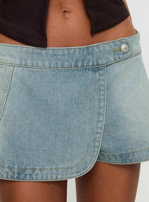 front view of model wearing Princess Polly Down For The Ride Denim Skort Light Wash Tall 