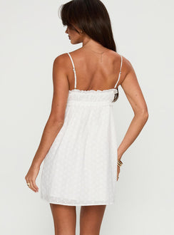 back view of model wearing Princess Polly Marliene Broiderie Mini Dress White Sweetheart Neckline 