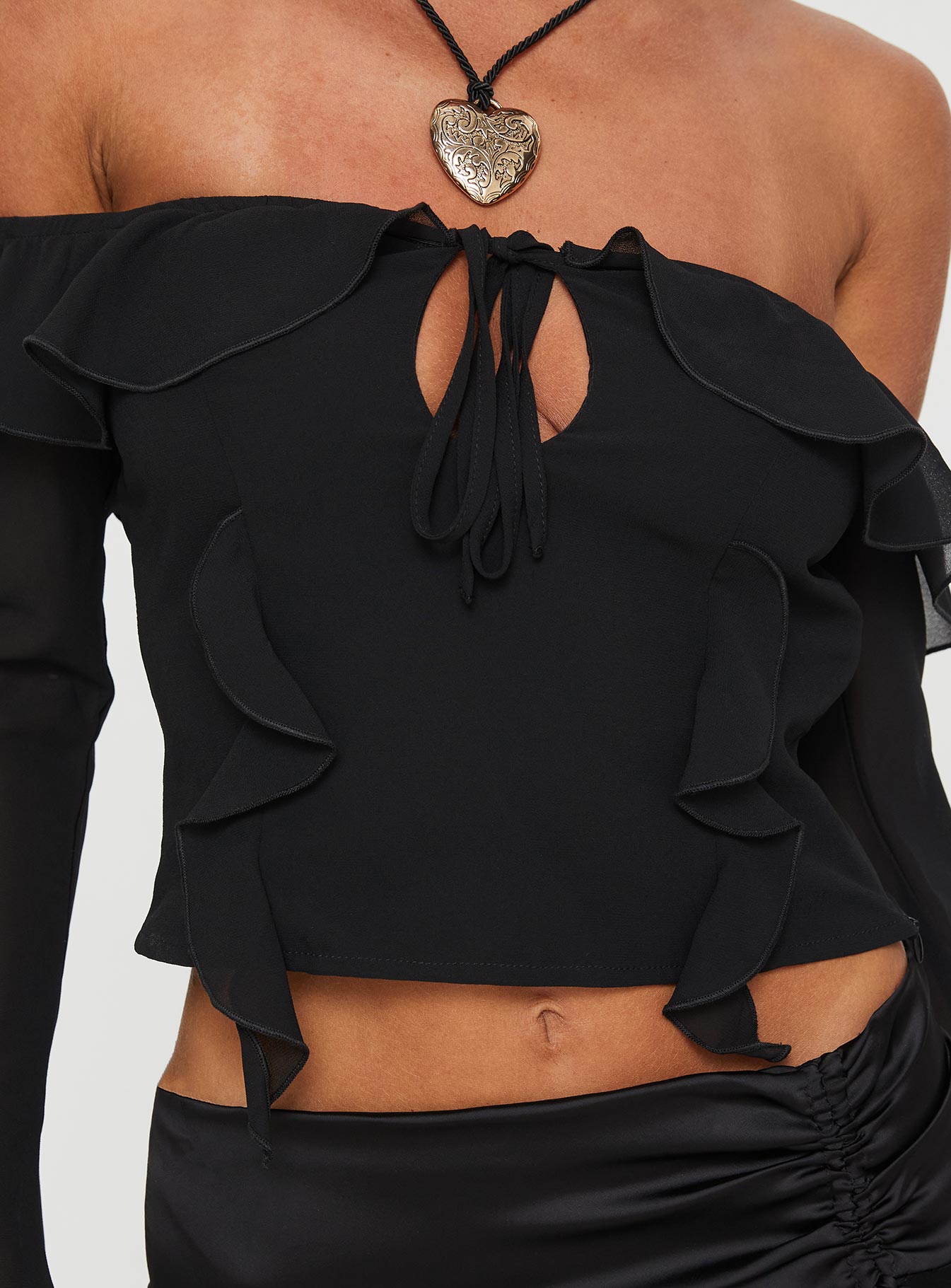 front view of model wearing Princess Polly Molins Off The Shoulder Top Black Full Sleeves straight 
