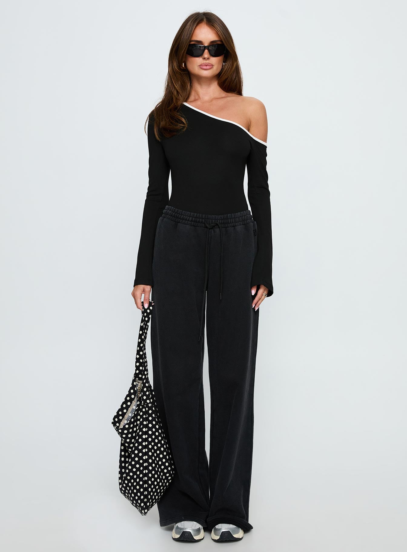 front view of model wearing Princess Polly Andrielle One Shoulder Long Sleeve Bodysuit Black / White Long Sleeve Tops 