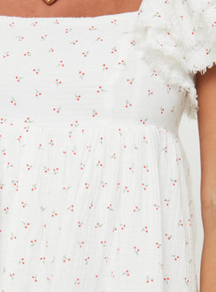 Cherry print playsuit Square neckline, elasticated sleeves, shirred band at & invisible zip fastening back, raw edge hem