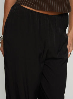 side view of model wearing Princess Polly Breina Satin Straight Leg Pants Black High Rise Pants 