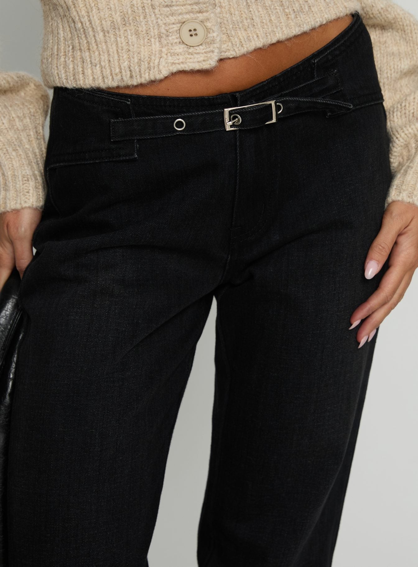 back view of model wearing Princess Polly Slow Ride Mid Rise Bootleg Belted Jeans Washed Black Mid Rise Jeans 