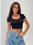 Front view of model wearing  front Princess Polly Short Sleeves High Neck  Phyllis Short Sleeve Top Black