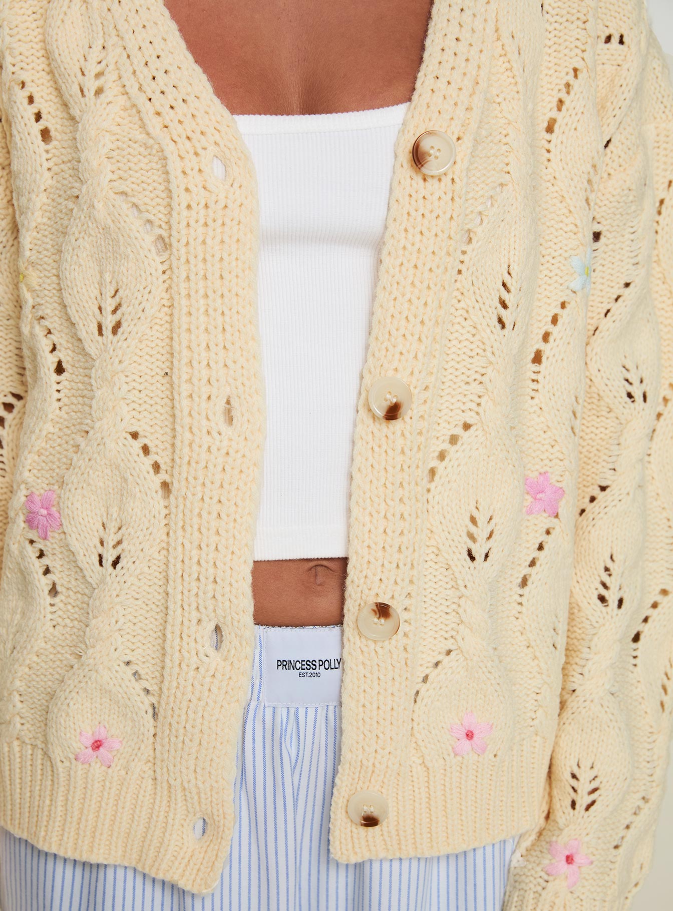 back view of model wearing Princess Polly Daffodil Cardigan Cream Cropped 