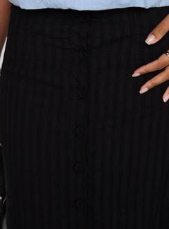 back view of model wearing Princess Polly Livie Maxi Skirt Black Maxi 