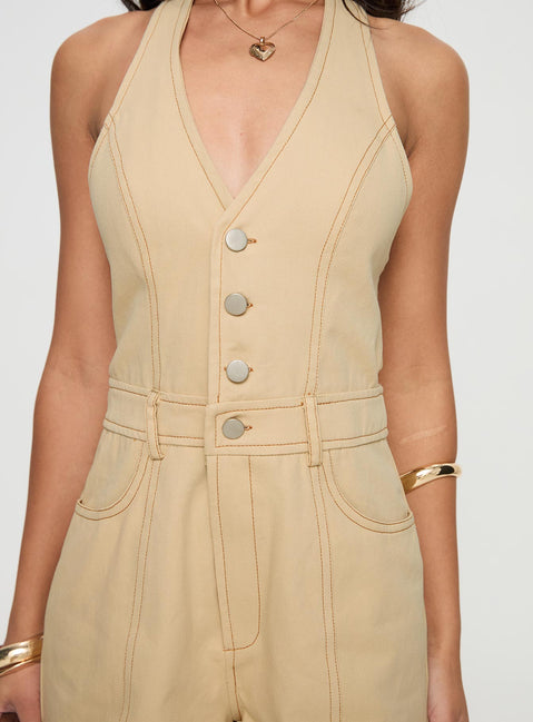 Romper Fixed halter neck, Button front fastening, partially exposed back, elastived back strap, belt looped waist, twin hip pockets