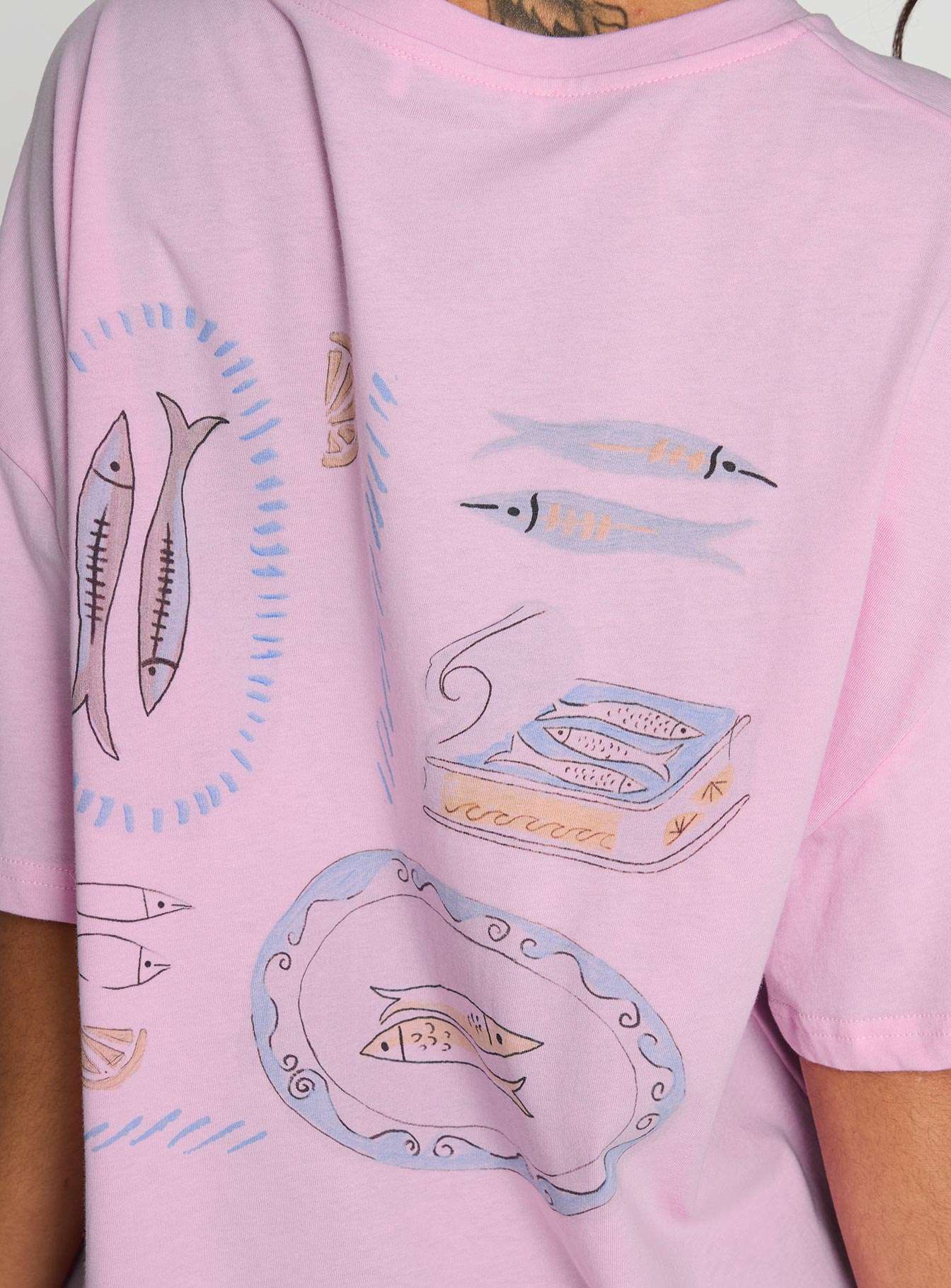 side view of model wearing Princess Polly Sardines Please Oversized Tee Pink Half Sleeves Crew Neck 