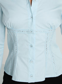 back view of model wearing Princess Polly Merritt Top Blue Full Sleeves V-Neck 